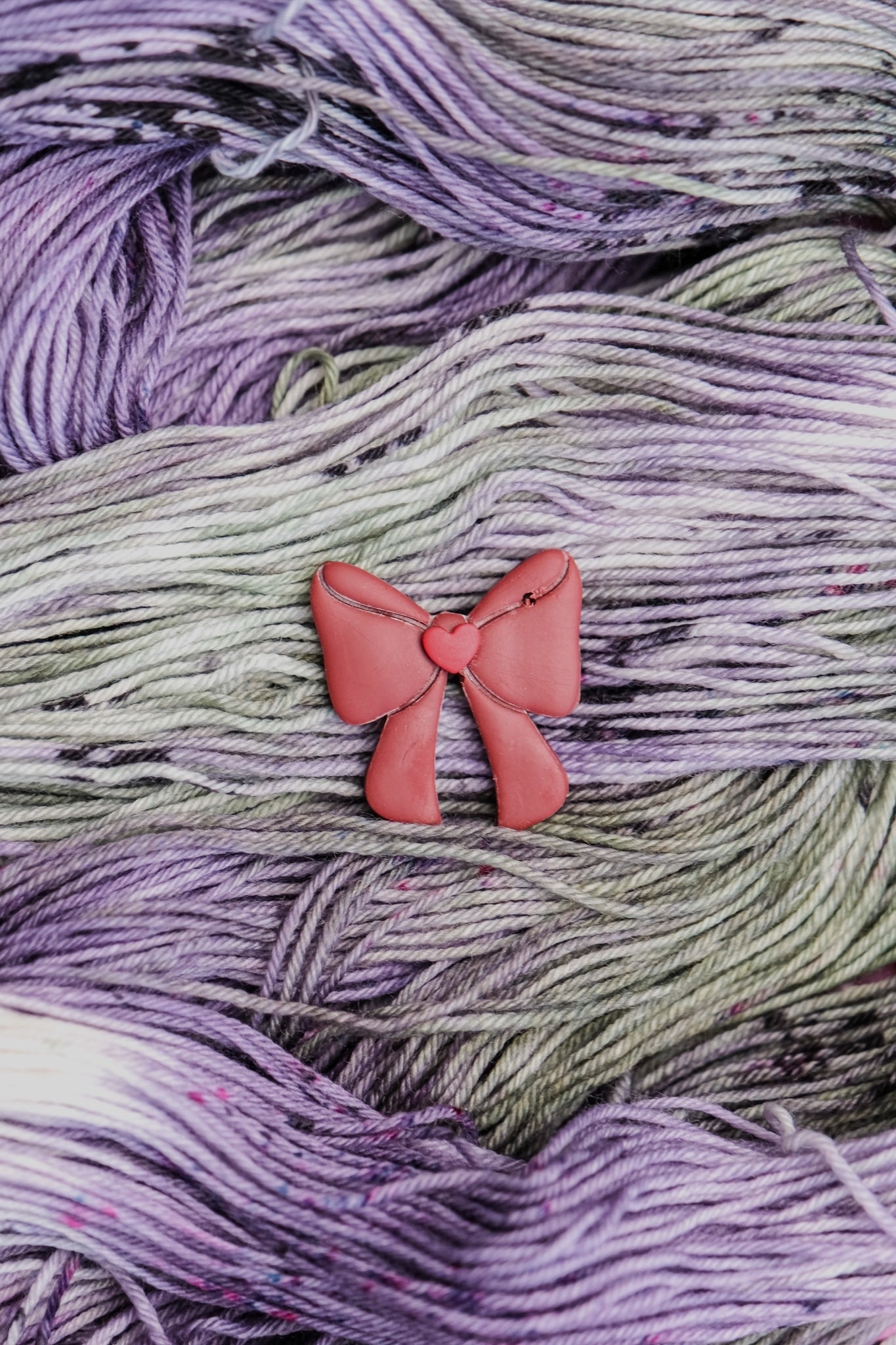 Pluto Bow Stitch Marker